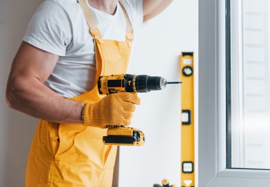 handyman-in-yellow-uniform-installs-new-window-by-2021-09-01-02-49-52-utc-min